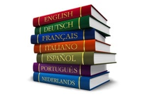 Stack of books in different languages. Legal translation services and legal document translation 